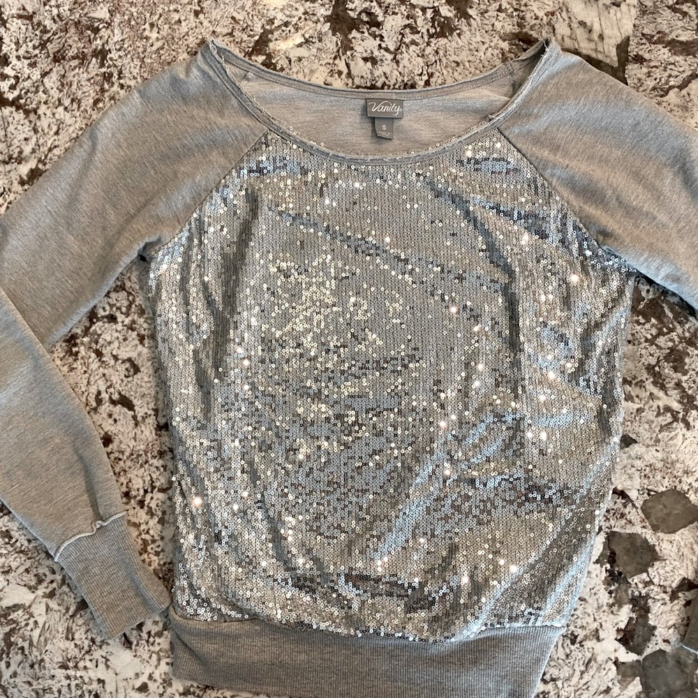 Sparkly fun sequin top, soft cotton back with long sleeves. Size S